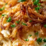 French onion chicken orzo casserole served in a baking dish
