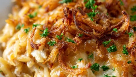 French onion chicken orzo casserole served in a baking dish